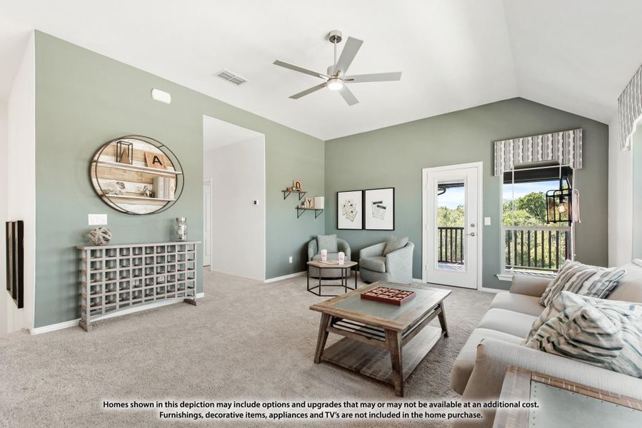 Living room with vaulted ceiling, ceiling fan, green-gray walls, carpet flooring, and door leading to covered balcony. Living room with vaulted ceiling, ceiling fan, green-gray walls, carpet flooring, and door leading to covered balcony.