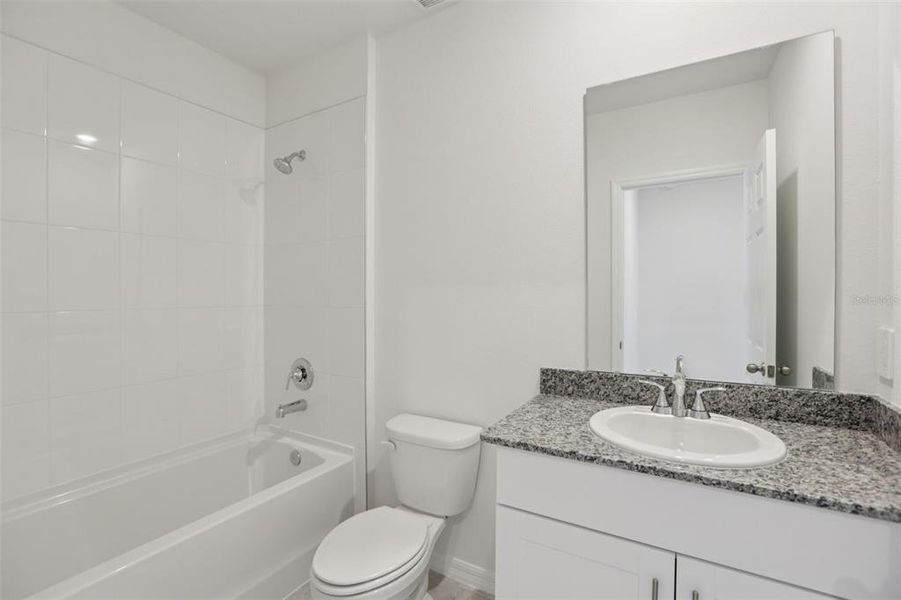 Furnished interior view inside a new home in Springs at Lake Alfred - Classic Series, Lake Alfred (Image 17).