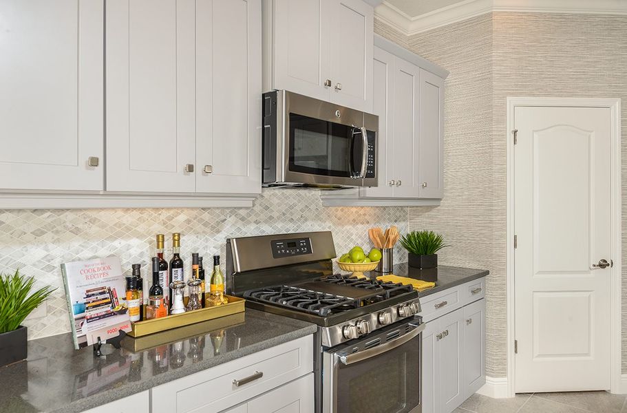 Representative furnished interior of a home built from the Tidewinds 2 by Neal Communities in Grand Park, Sarasota (Image 19).