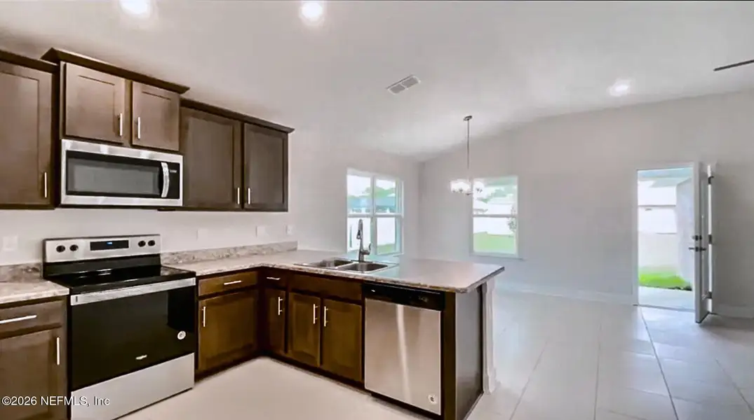 Furnished interior view inside a new home in , Jacksonville (Image 3). Furnished interior view inside a new home in , Jacksonville (Image 3).