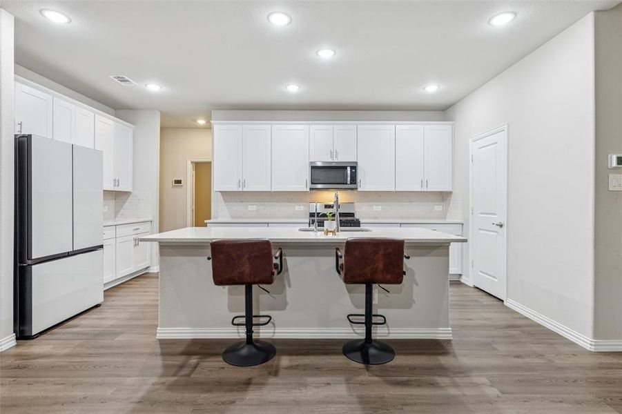 Furnished interior view inside a new home in Wolf Creek Farms - Signature Series, Melissa (Image 25).