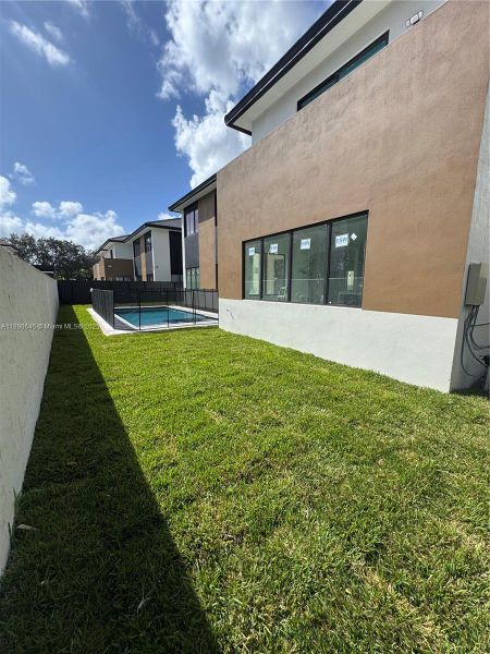 Exterior details and patio area of a home in , Miami (Image 2).