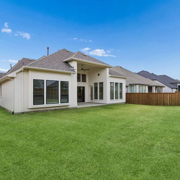 Exterior details and patio area of a home in Mosaic – 70′ Lots, Prosper (Image 31).