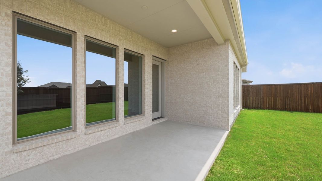 Exterior details and patio area of a home in Devonshire, Forney (Image 4).