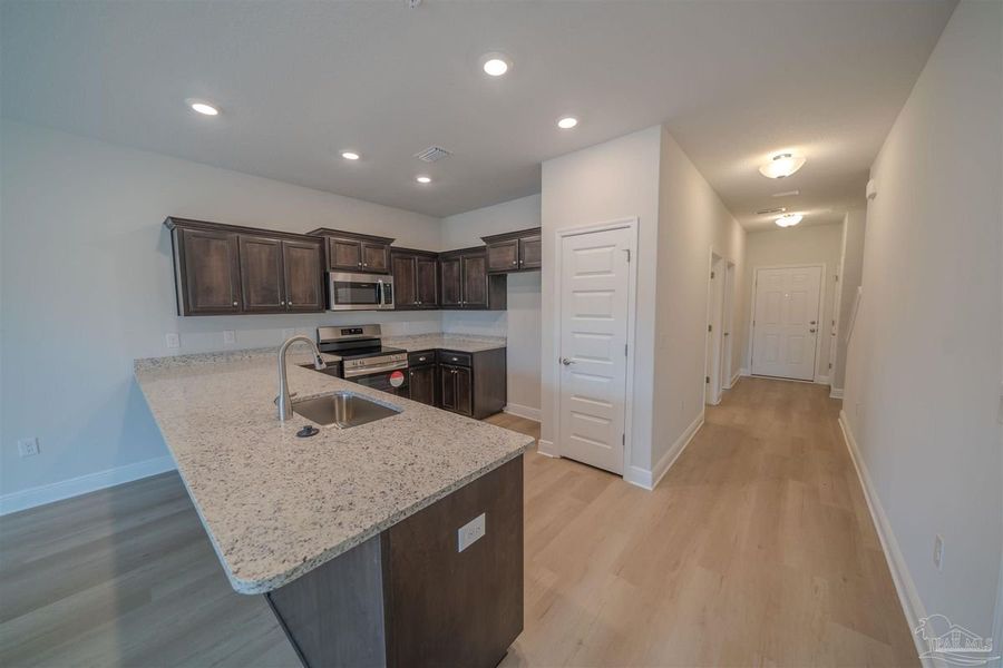 Representative furnished interior of a home built from the Plan 1766 Townhome by Adams Homes in Lexlee Estates, Pensacola (Image 4). Representative furnished interior of a home built from the Plan 1766 Townhome by Adams Homes in Lexlee Estates, Pensacola (Image 4).