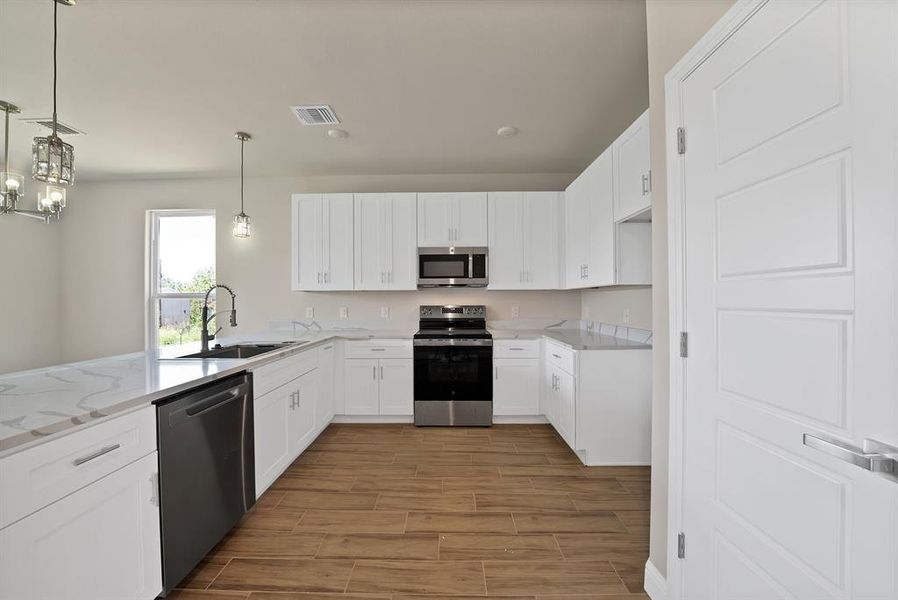 Furnished interior view inside a new home in , Granbury (Image 5).