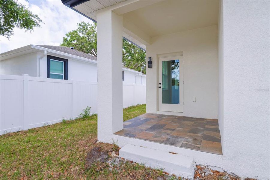 Front exterior of a new home in , Tampa, FL, highlighting curb appeal (Image 26). Front exterior of a new home in , Tampa, FL, highlighting curb appeal (Image 26).