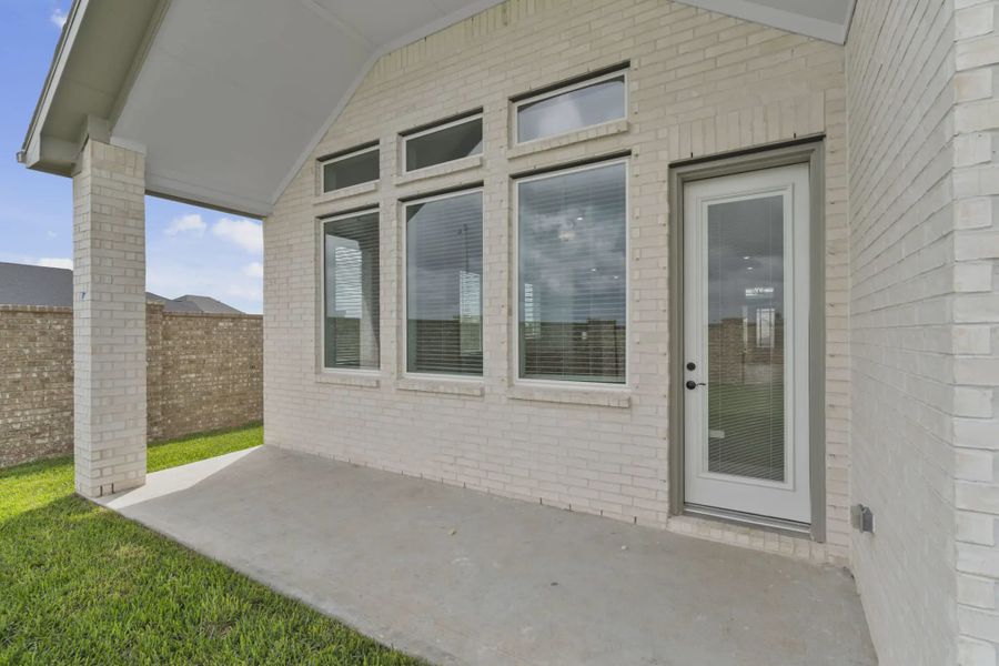 Representative exterior details of a home built from the Lauren by Chesmar Homes in Beacon Point, Texas City (Image 4). Representative exterior details of a home built from the Lauren by Chesmar Homes in Beacon Point, Texas City (Image 4).