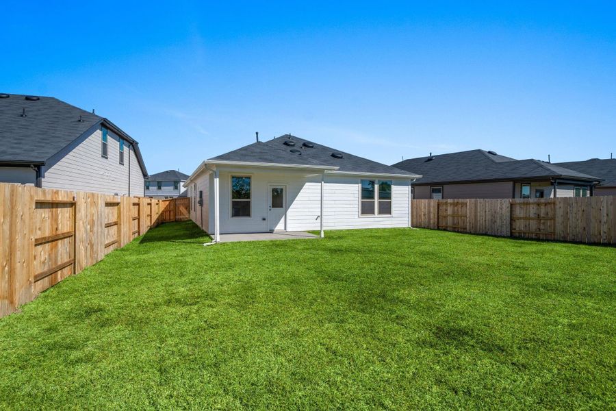 Exterior details and patio area of a home in Crosby Farms, Crosby (Image 3).