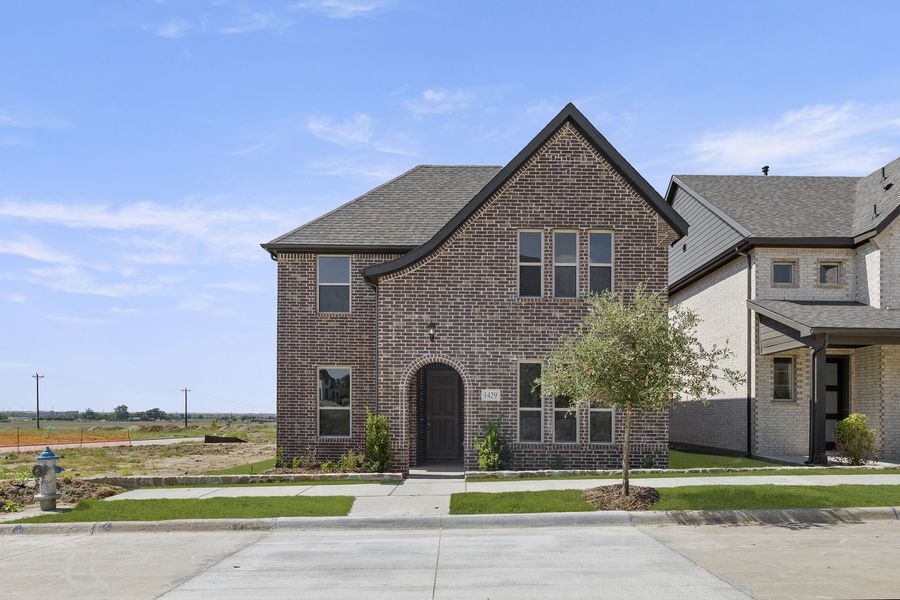 Front exterior of a new home in Hillside Village 40s, Celina, TX, highlighting curb appeal (Image 2).