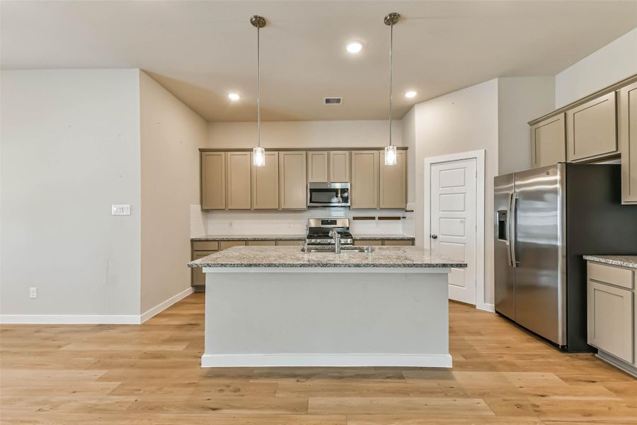 kitchen lots of storage and walk in pantry
