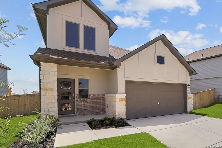 Front exterior of a new home in The Parklands, Schertz, TX, highlighting curb appeal (Image 1). Front exterior of a new home in The Parklands, Schertz, TX, highlighting curb appeal (Image 1).