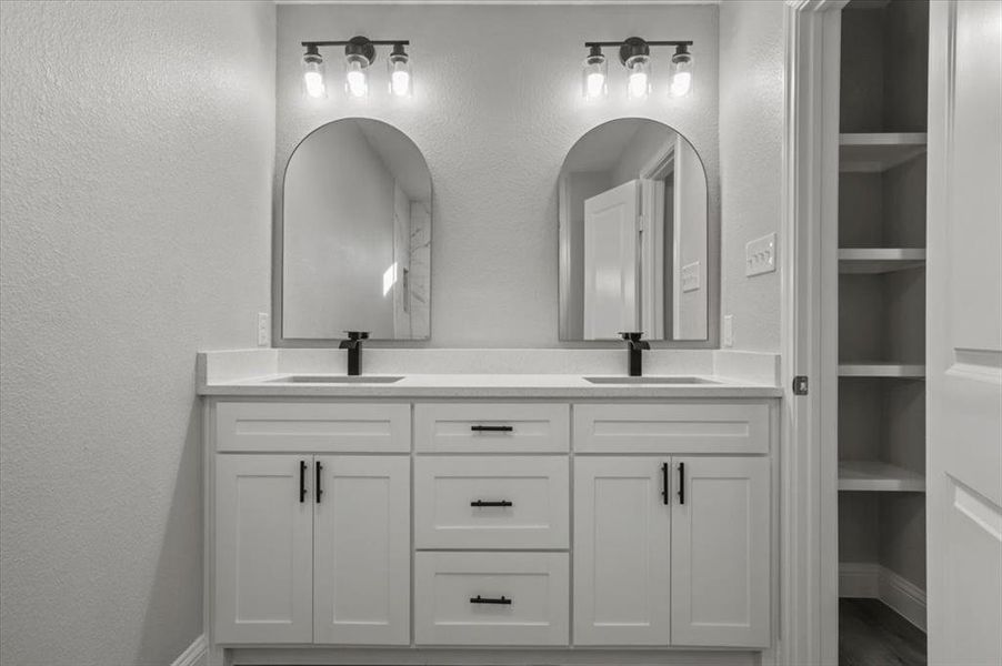 Bathroom featuring vanity and built in features