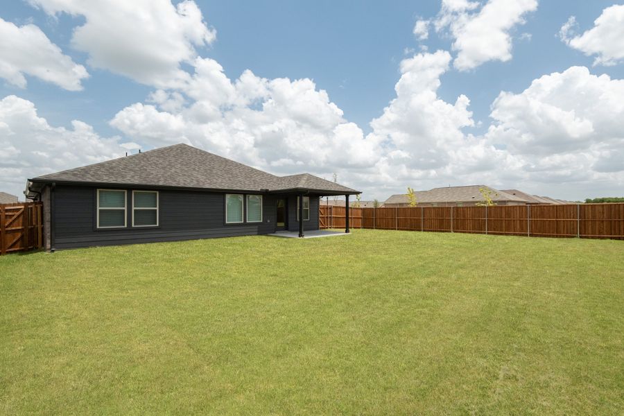 Exterior details and patio area of a home in Wildcat Ranch, Crandall (Image 2).