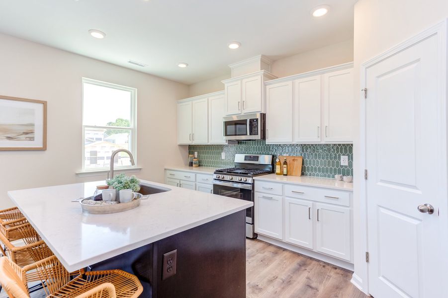 Representative furnished interior of a home built from the The Poppy by Chesapeake Homes in The Willows, Loris (Image 14).