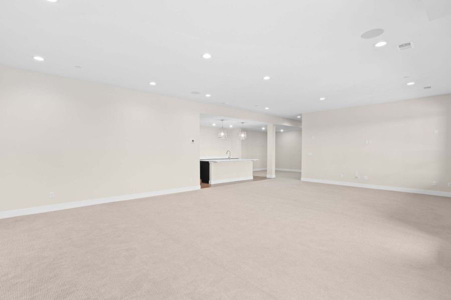 Residence 2 | Basement Rec Room | V3 layout | The Summit at Castle Pines by Trumark Homes