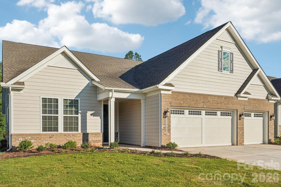 Front exterior of a new home in , Charlotte, NC, highlighting curb appeal (Image 24).