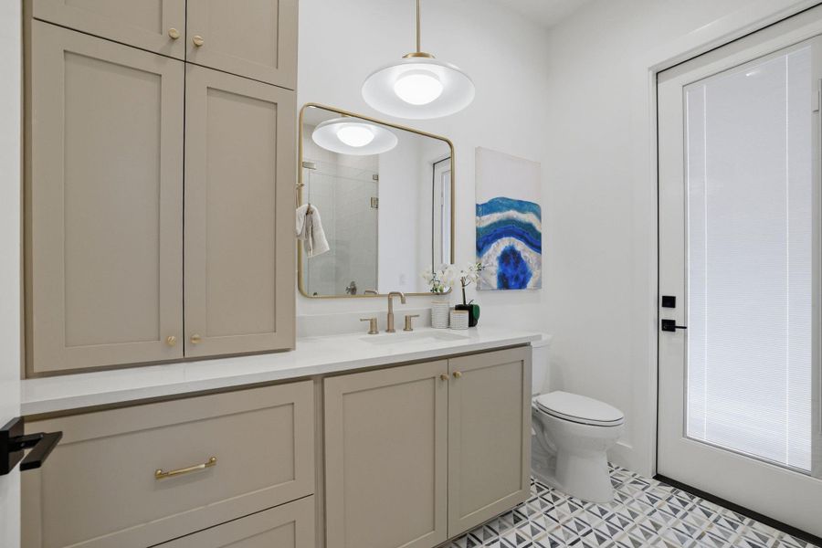 Full bathroom with walk-in shower off Guest Suite/Office