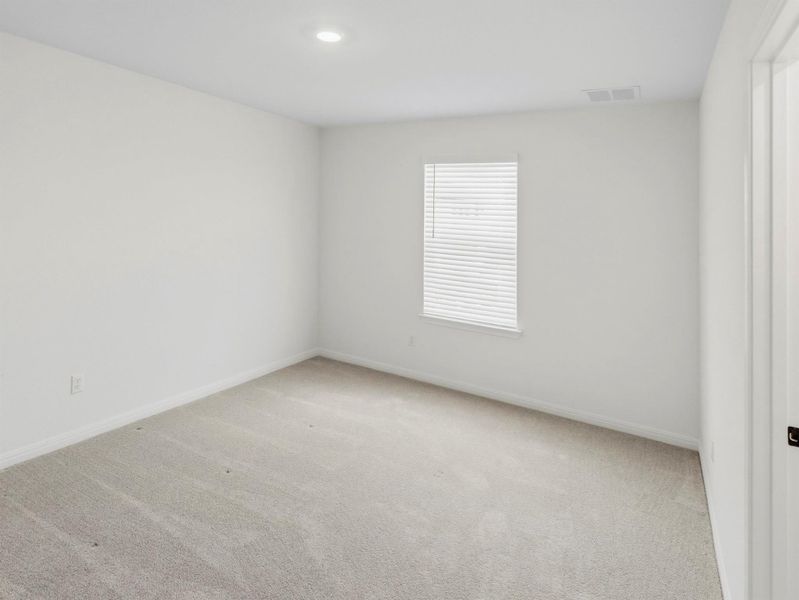A well-lit room awaits your personal touch, offering versatility for any use. A well-lit room awaits your personal touch, offering versatility for any use.