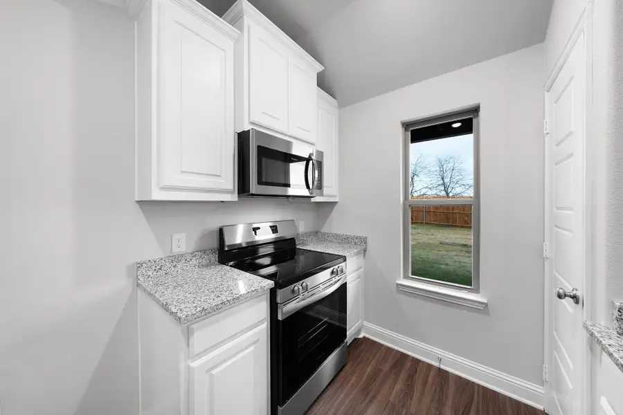 Furnished interior view inside a new home in Stonecreek, Sulphur Springs (Image 7).