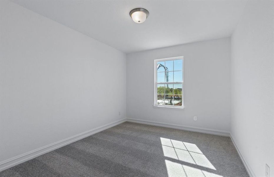 Spacious secondary bedroom with ample closet space *real home pictured