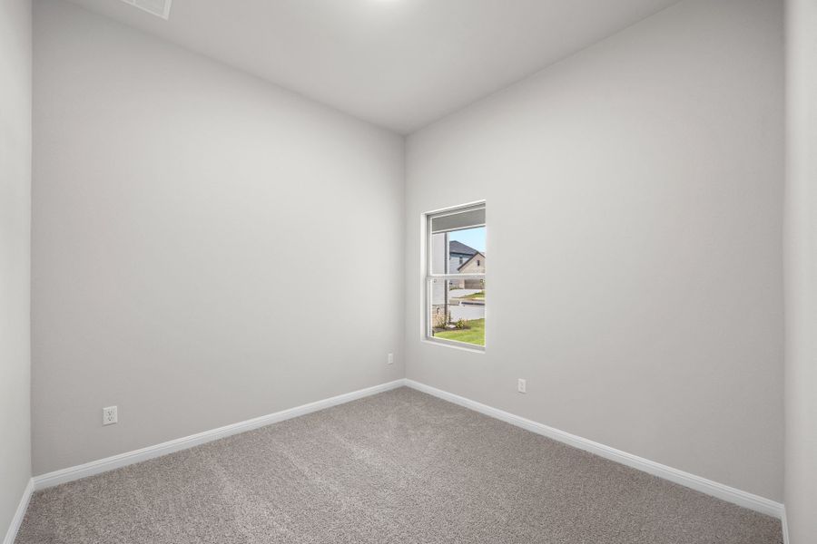 Bedroom in the Spruce home plan by Trophy Signature Homes - REPRESENTATIVE PHOTO Bedroom in the Spruce home plan by Trophy Signature Homes - REPRESENTATIVE PHOTO