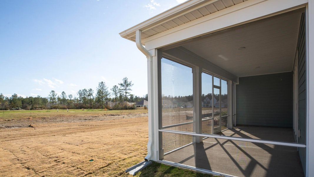 Exterior details and patio area of a home in Indigo Preserve, Leland (Image 20).