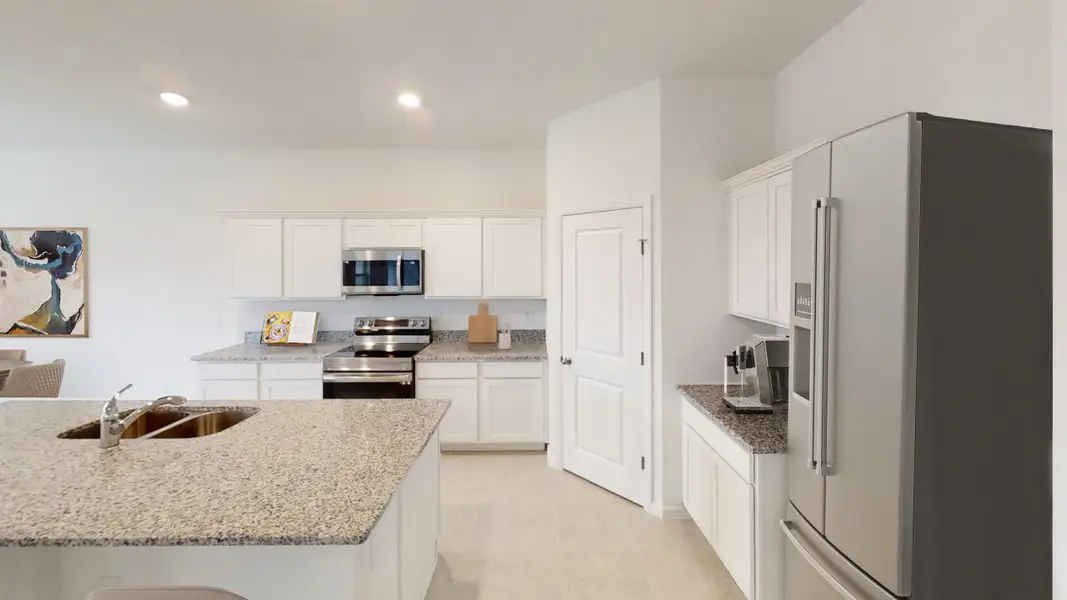 Representative furnished interior of a home built from the Hawking by Starlight Homes in Hawks Run, Kissimmee (Image 5).