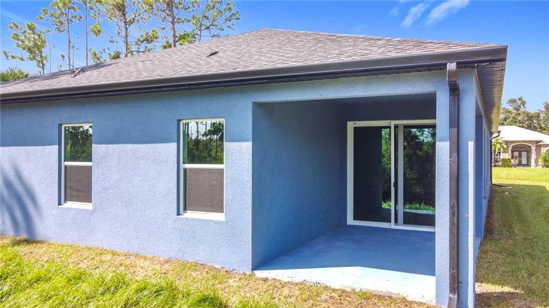 Front exterior of a new home in , North Port, FL, highlighting curb appeal (Image 1). Front exterior of a new home in , North Port, FL, highlighting curb appeal (Image 1).