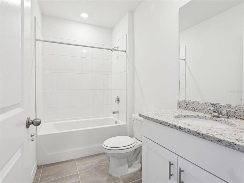 Furnished interior view inside a new home in The Reserve at Van Oaks, Auburndale (Image 15).