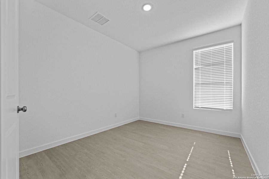 Spacious, unfurnished interior of a new home in Waterwheel: Coastline Collection, San Antonio (Image 21).