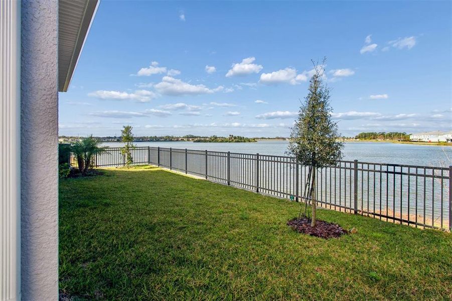 Exterior details and patio area of a home in Emerald Landing at Waterside at Lakewood Ranch – Lake Series, Sarasota (Image 24).