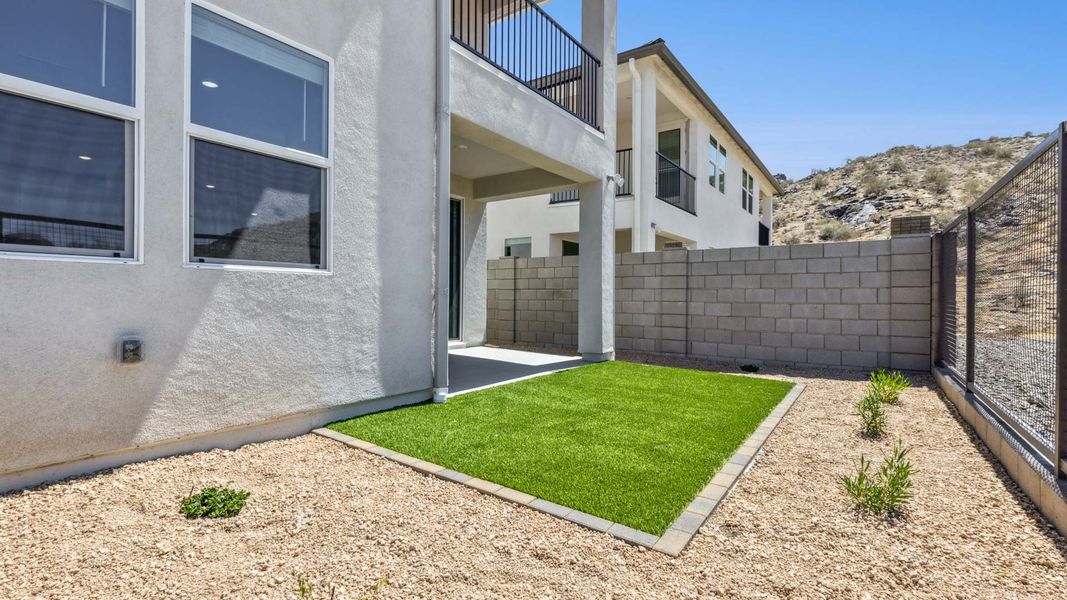 Front exterior of a new home in Avance, Phoenix, AZ, highlighting curb appeal (Image 18).