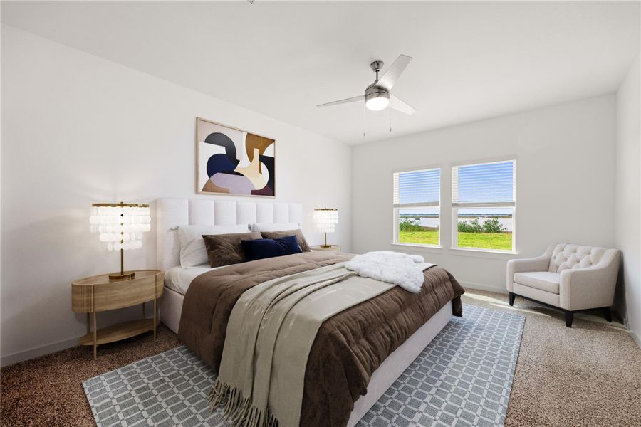 Welcome home to a meticulously designed primary suite that blends comfort and style seamlessly. Enjoy a bright, airy atmosphere with all the modern conveniences you desire, including a modern ceiling fan for comfort. *Virtually Staged
