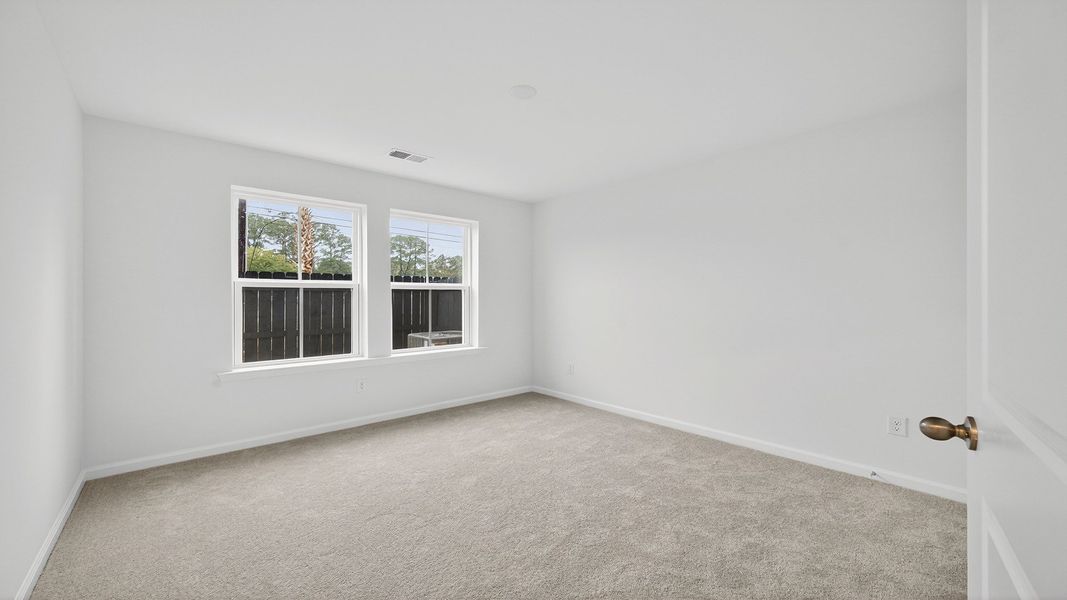 Furnished interior view inside a new home in Clear Springs Townhomes, North Charleston (Image 17).