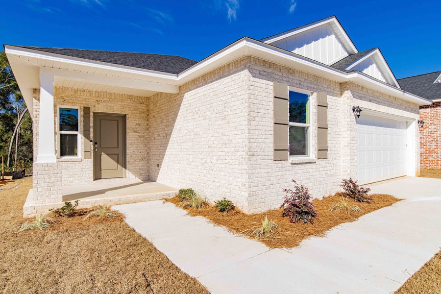 Exterior details and patio area of a home in Coastal Communities, Edgewater (Image 36).