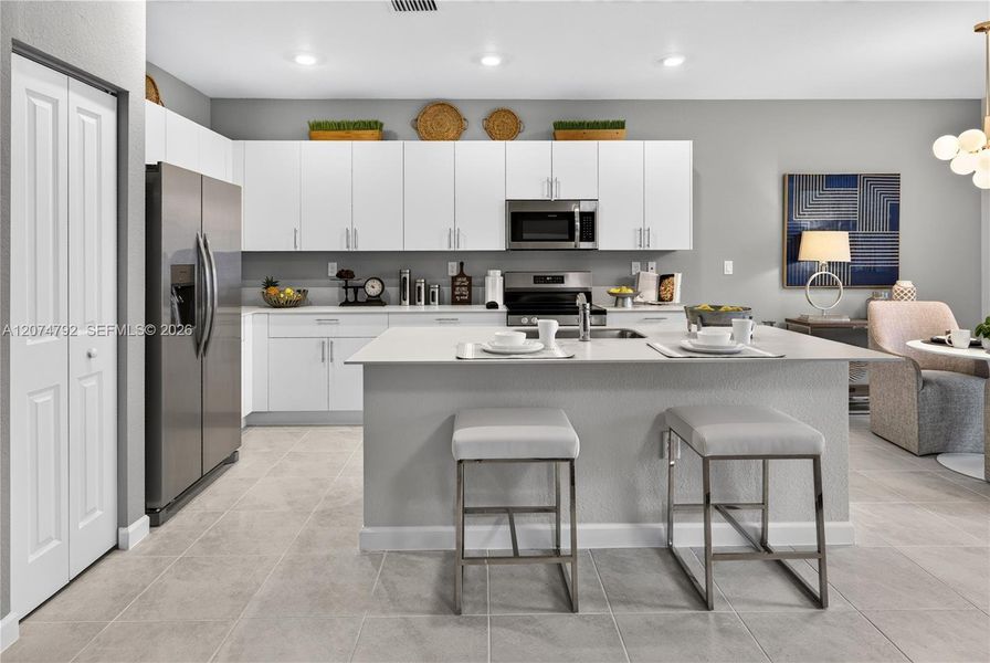 Furnished interior view inside a new home in Acacia Groves, Miami (Image 3).