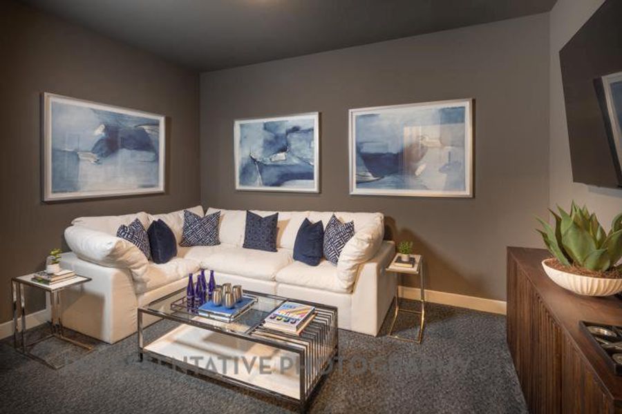 Carpeted living room with baseboards Carpeted living room with baseboards