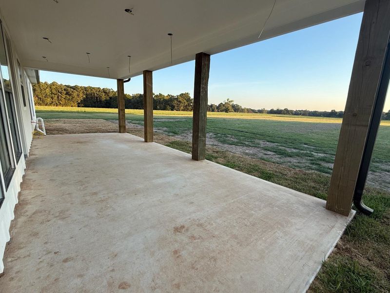 Exterior details and patio area of a home in , New Waverly (Image 2). Exterior details and patio area of a home in , New Waverly (Image 2).