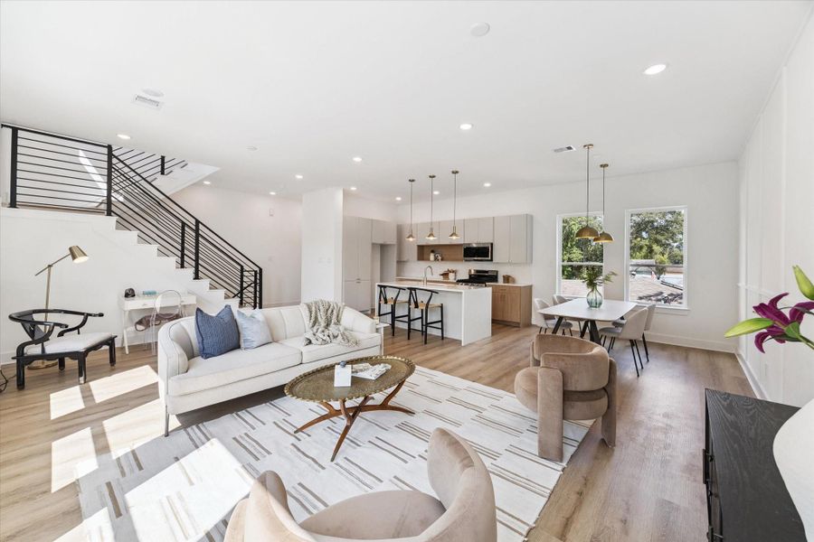 This home is not the average new build, the finishes are so elegant and upscale. These beautiful floors run throughout the living/dining/kitchen level as well as all bedrooms, there is no carpet. This home is not the average new build, the finishes are so elegant and upscale. These beautiful floors run throughout the living/dining/kitchen level as well as all bedrooms, there is no carpet.