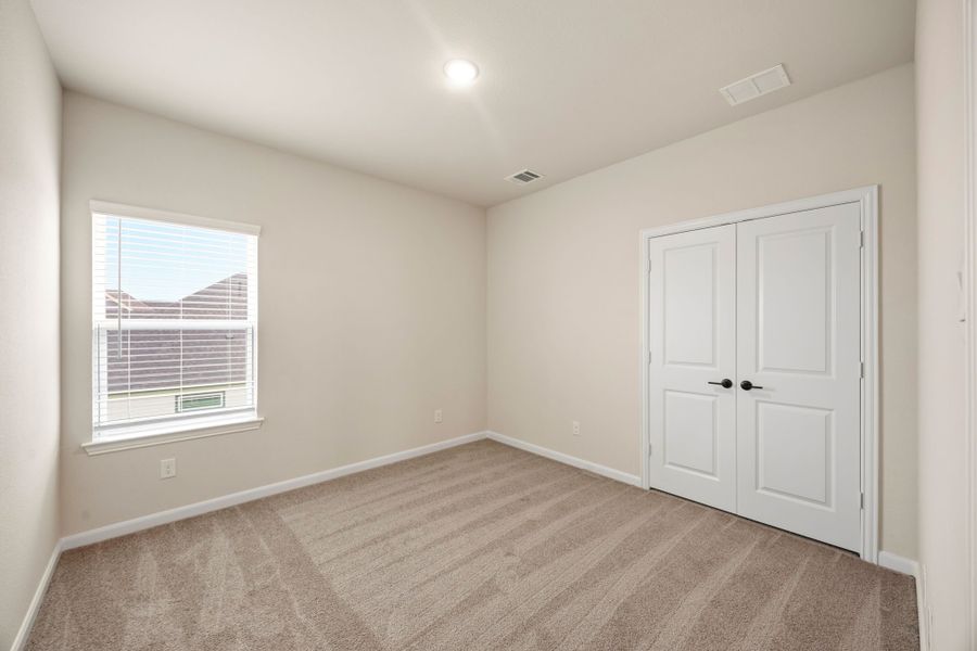 Representative unfurnished interior of a home built from the Peyton III by Cambridge Homes in Lake Park, Rowlett (Image 21).