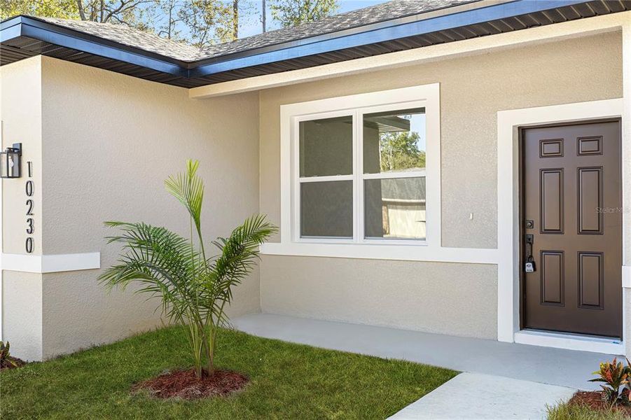 Exterior details and patio area of a home in , Citrus Springs (Image 24).