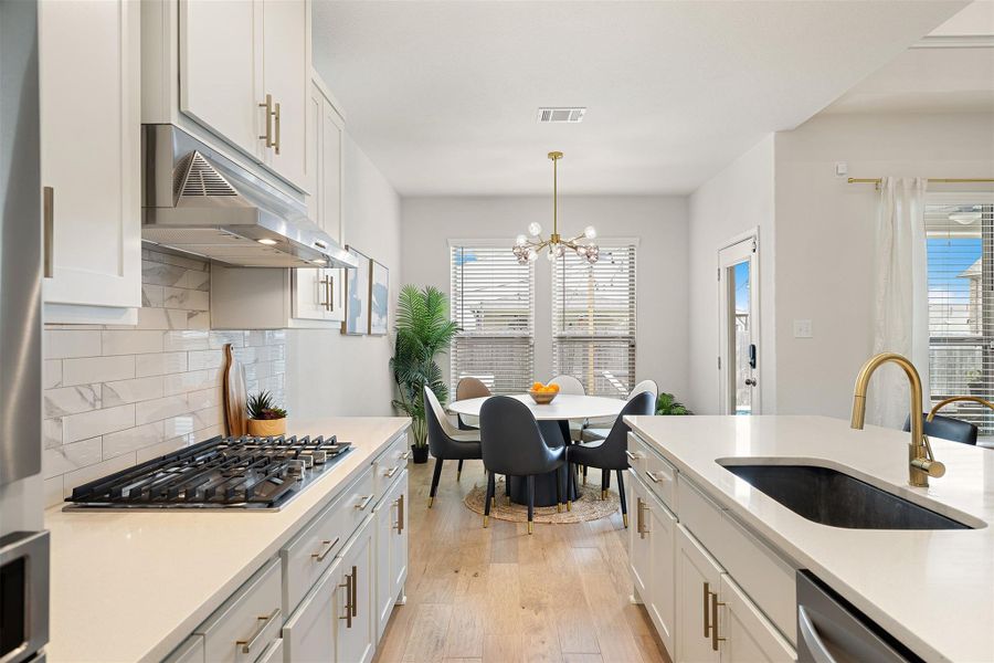 The layout keeps everything within easy reach while still feeling open to the rest of the main floor