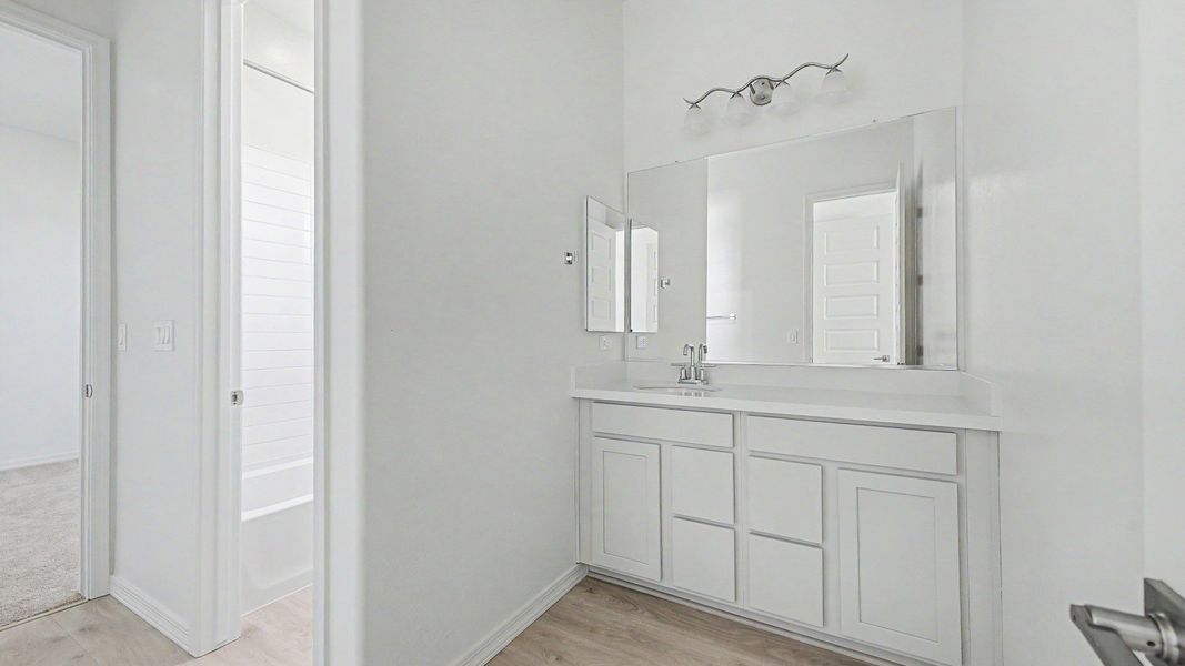 Representative furnished interior of a home built from the Montoro by DRB Homes in Windrose, Waddell (Image 20).