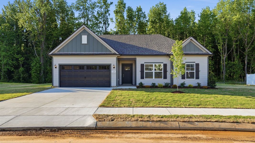 Front exterior of a new home in Stillwater, Tullahoma, TN, highlighting curb appeal (Image 2). Front exterior of a new home in Stillwater, Tullahoma, TN, highlighting curb appeal (Image 2).