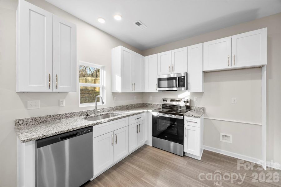 Furnished interior view inside a new home in , Bessemer City (Image 13).