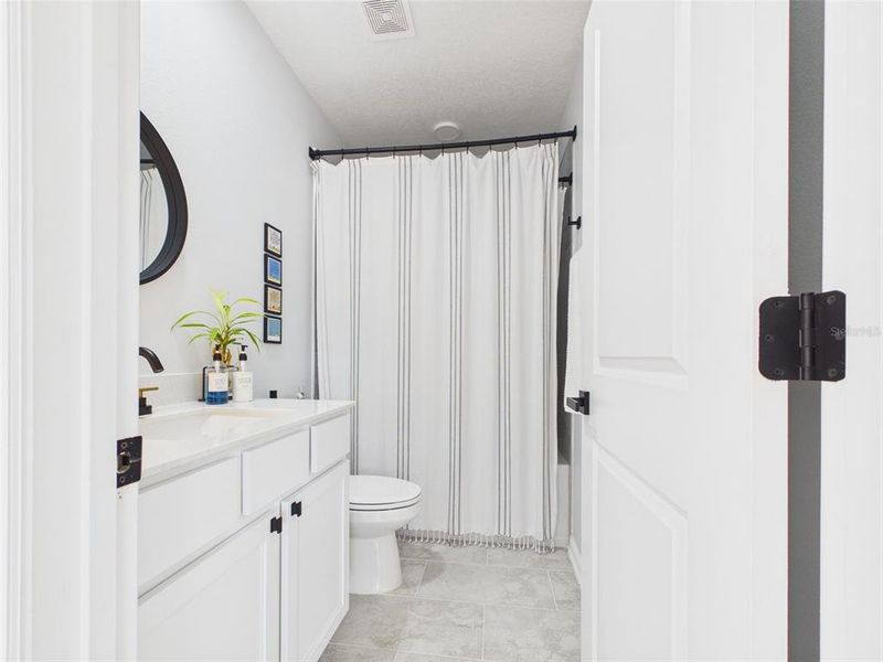 Furnished interior view inside a new home in Vineland Reserve, Osteen (Image 15).