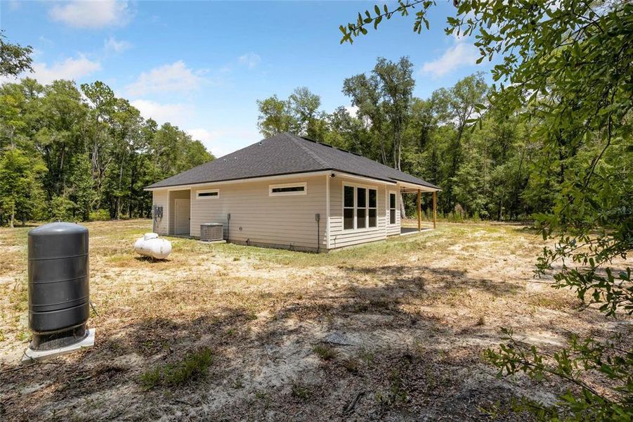 Exterior details and patio area of a home in , Alachua (Image 32).