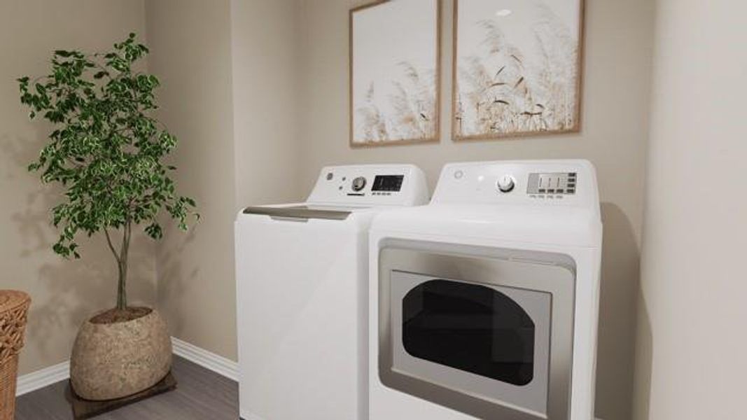 Laundry area with independent washer and dryer and wood finished floors