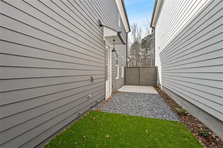Exterior details and patio area of a home in Harmony, Auburn (Image 3).